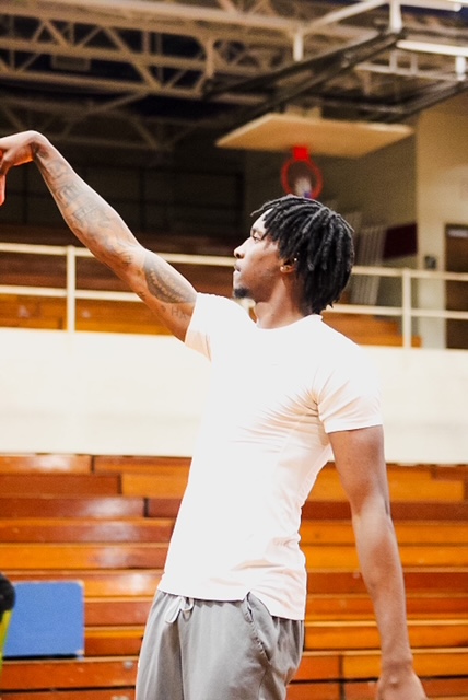Coach Snow demonstrating shooting form